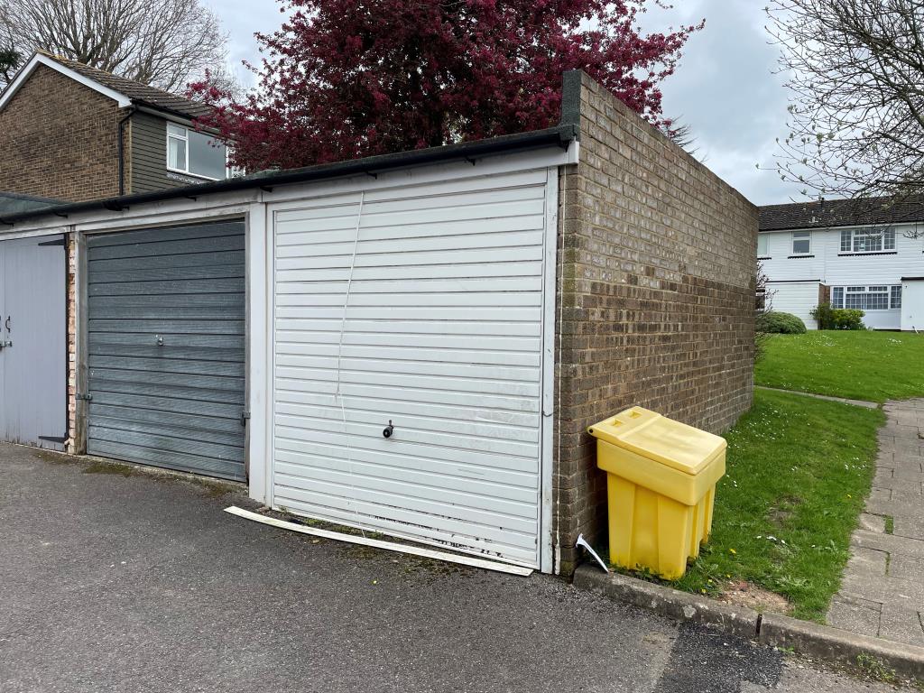 Lot: 27 - HOUSE IN NEED OF REFURBISHMENT - brick garage in compound with up and over door